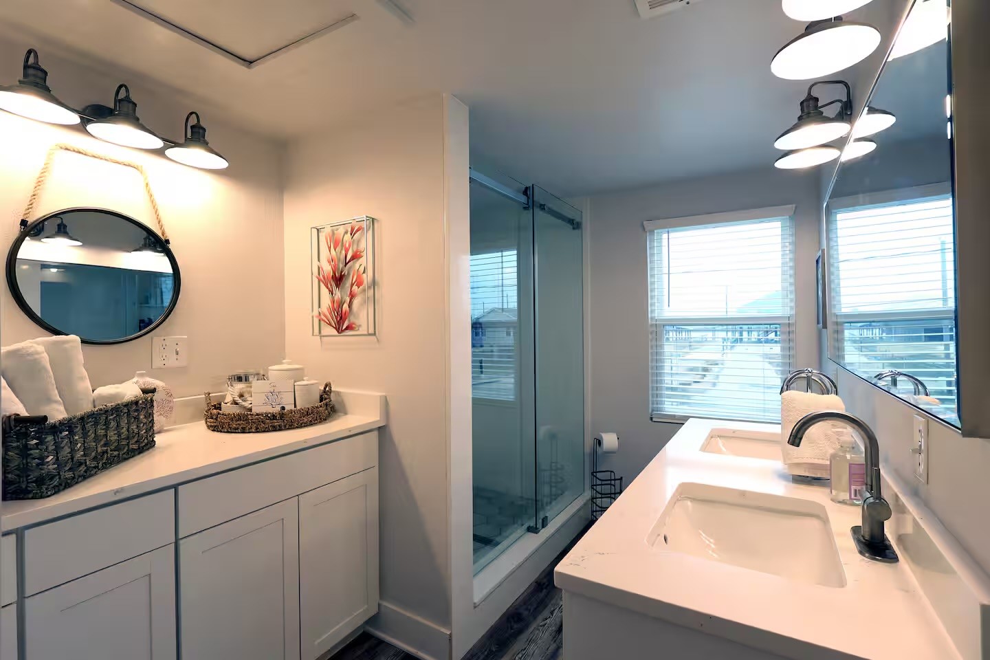 310 Shark Lane Surfside Beach, TX 77541 - Photo 13 of 33 a bathroom with a sink and a mirror