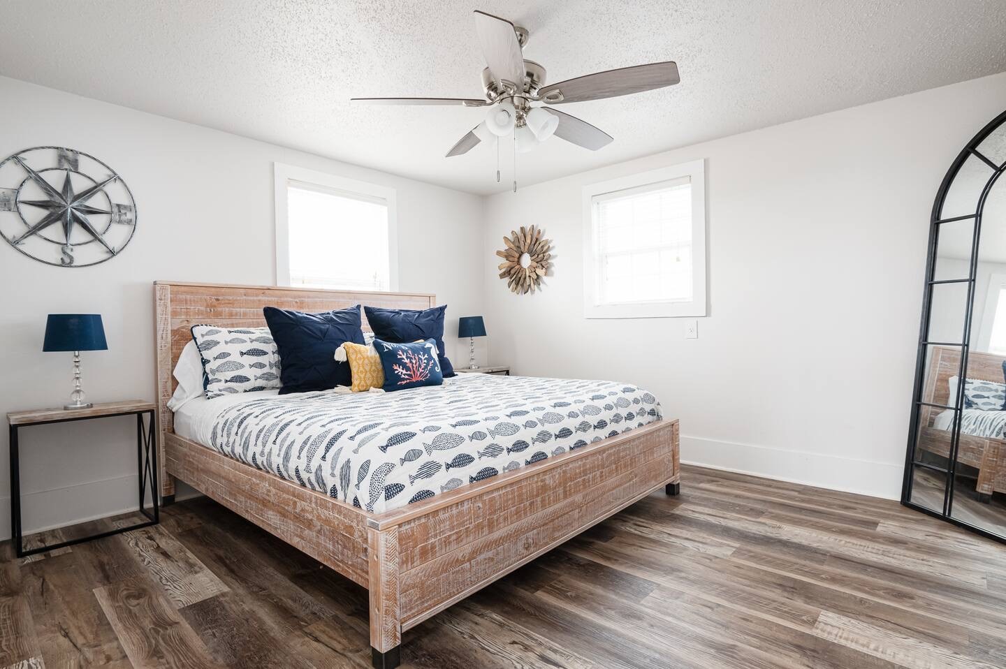 310 Shark Lane Surfside Beach, TX 77541 - Photo 14 of 33 a bedroom with a bed and a window