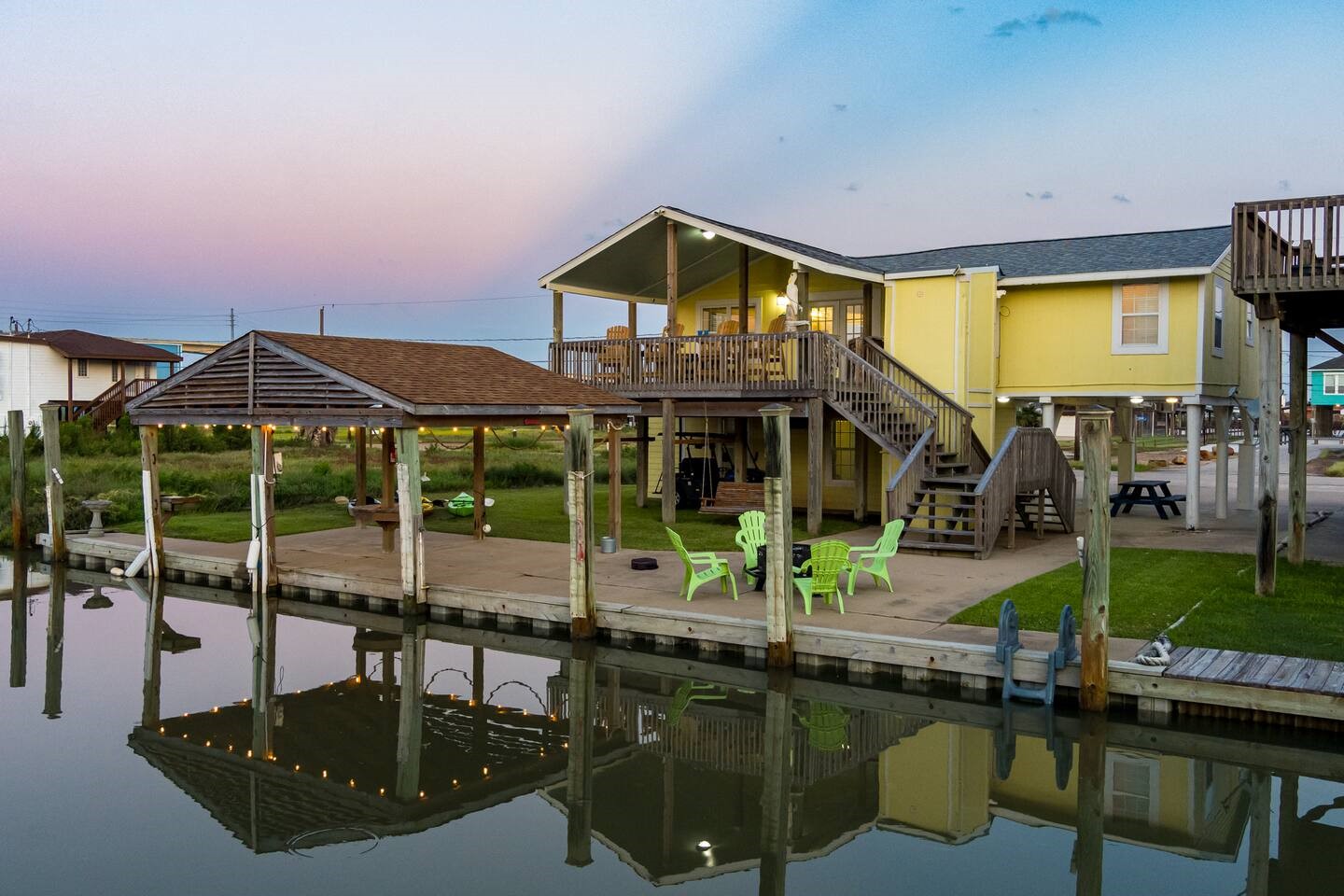 310 Shark Lane Surfside Beach, TX 77541 - Photo 33 of 33 a view of a house with backyard and sitting area