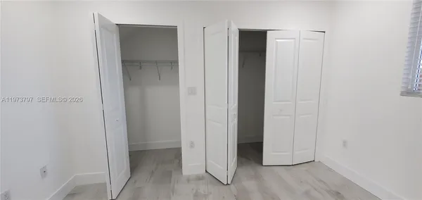 an empty room with closet