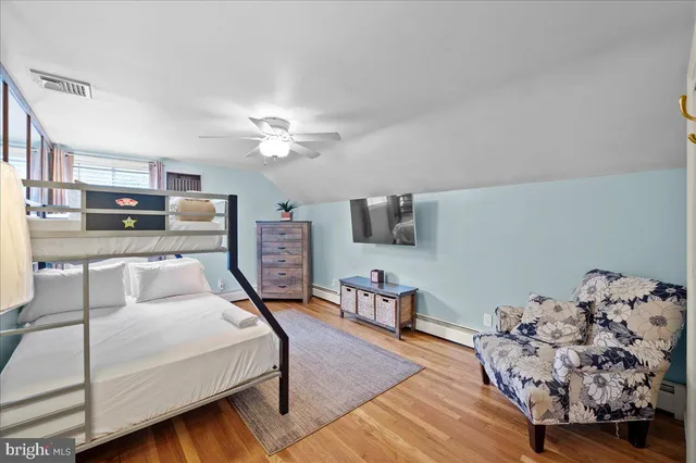a bathroom with a granite countertop sink mirror and double