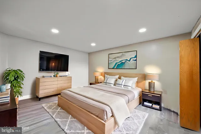 a front view of a house with a yard table and chairs