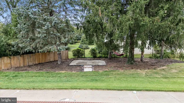 a view of outdoor space with deck and yard