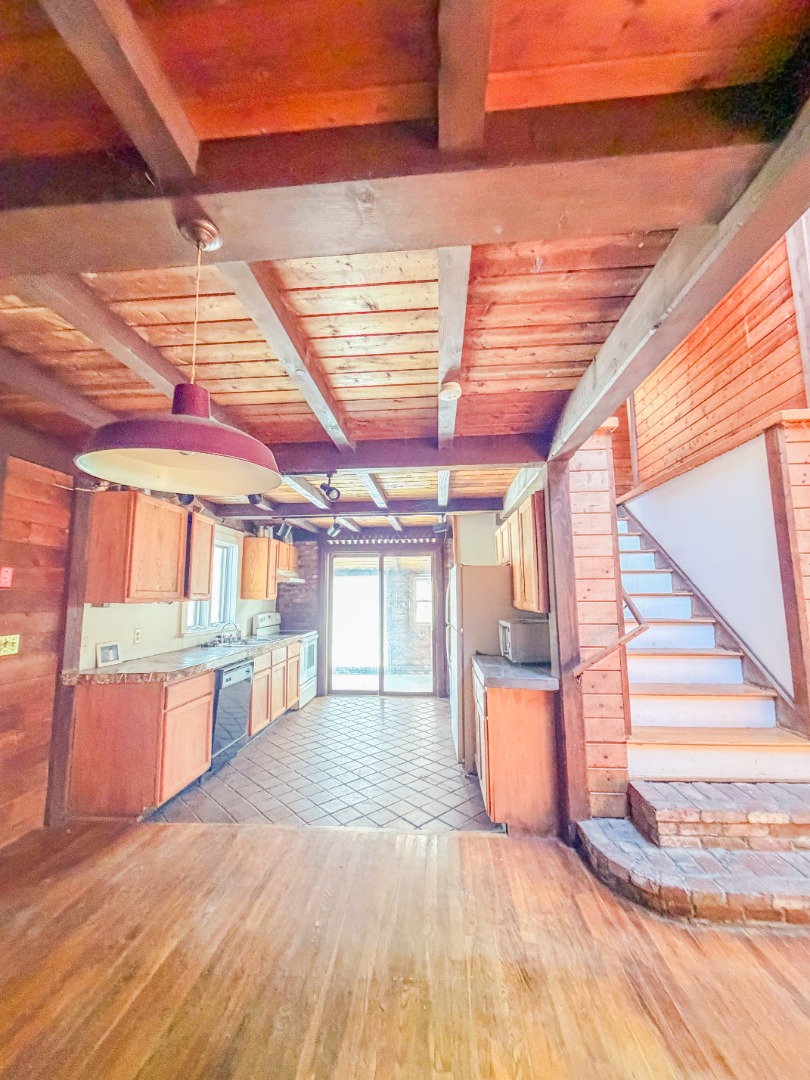 25 Vineyard Meadow Farms Road West Tisbury, MA 02568 - Photo 15 of 30 an empty room with wooden floor and windows