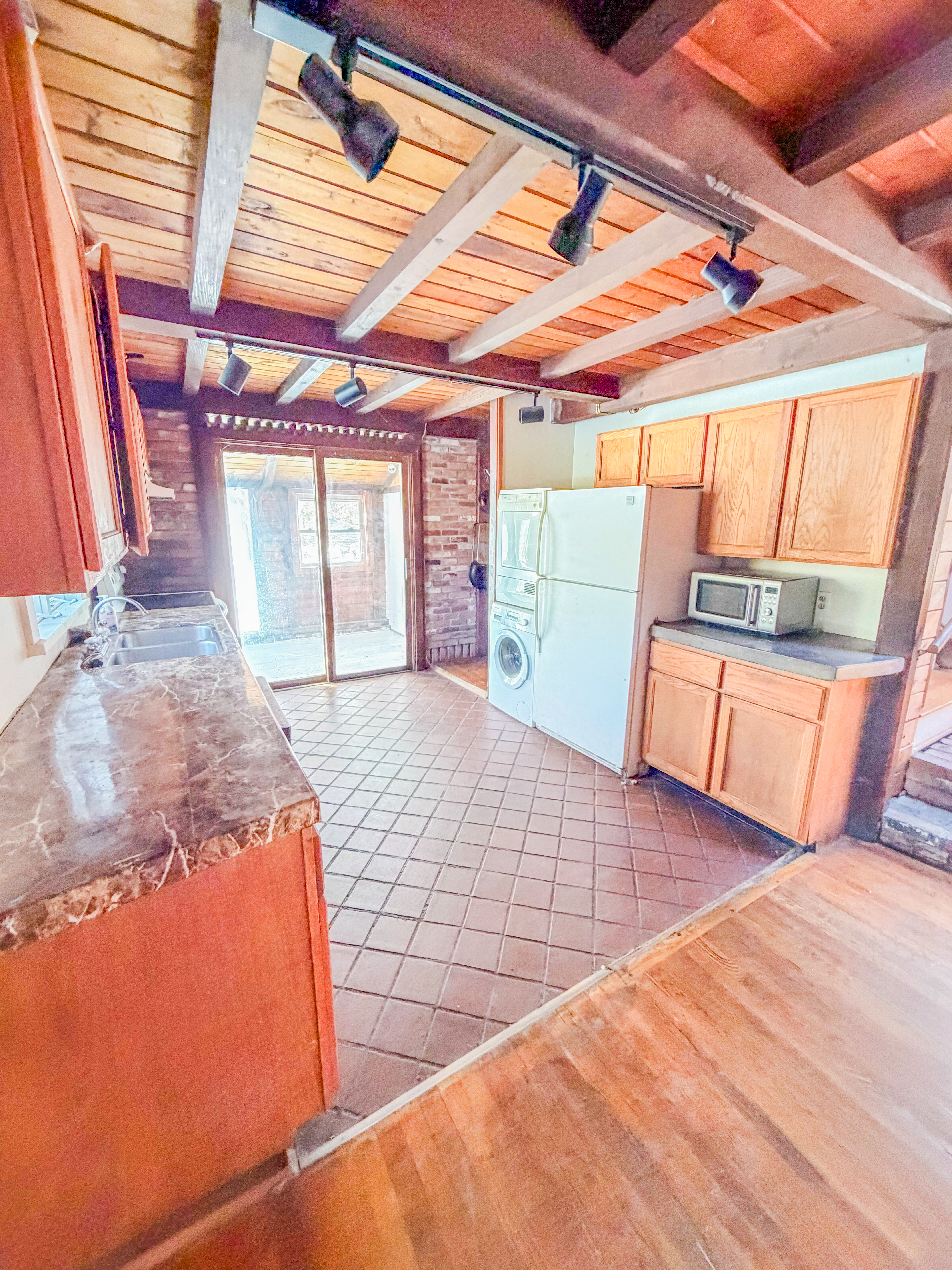 25 Vineyard Meadow Farms Road West Tisbury, MA 02568 - Photo 16 of 30 a view of a room with wooden floor and chair