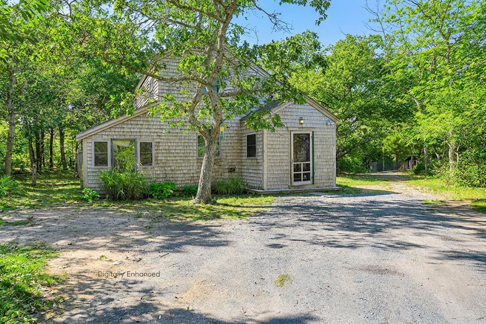 25 Vineyard Meadow Farms Road West Tisbury, MA 02568 - Photo 2 of 30 a view of a house with a yard and large tree