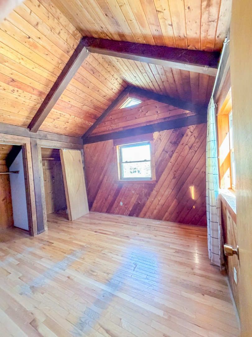 25 Vineyard Meadow Farms Road West Tisbury, MA 02568 - Photo 27 of 30 a view of a room with wooden floor and a window