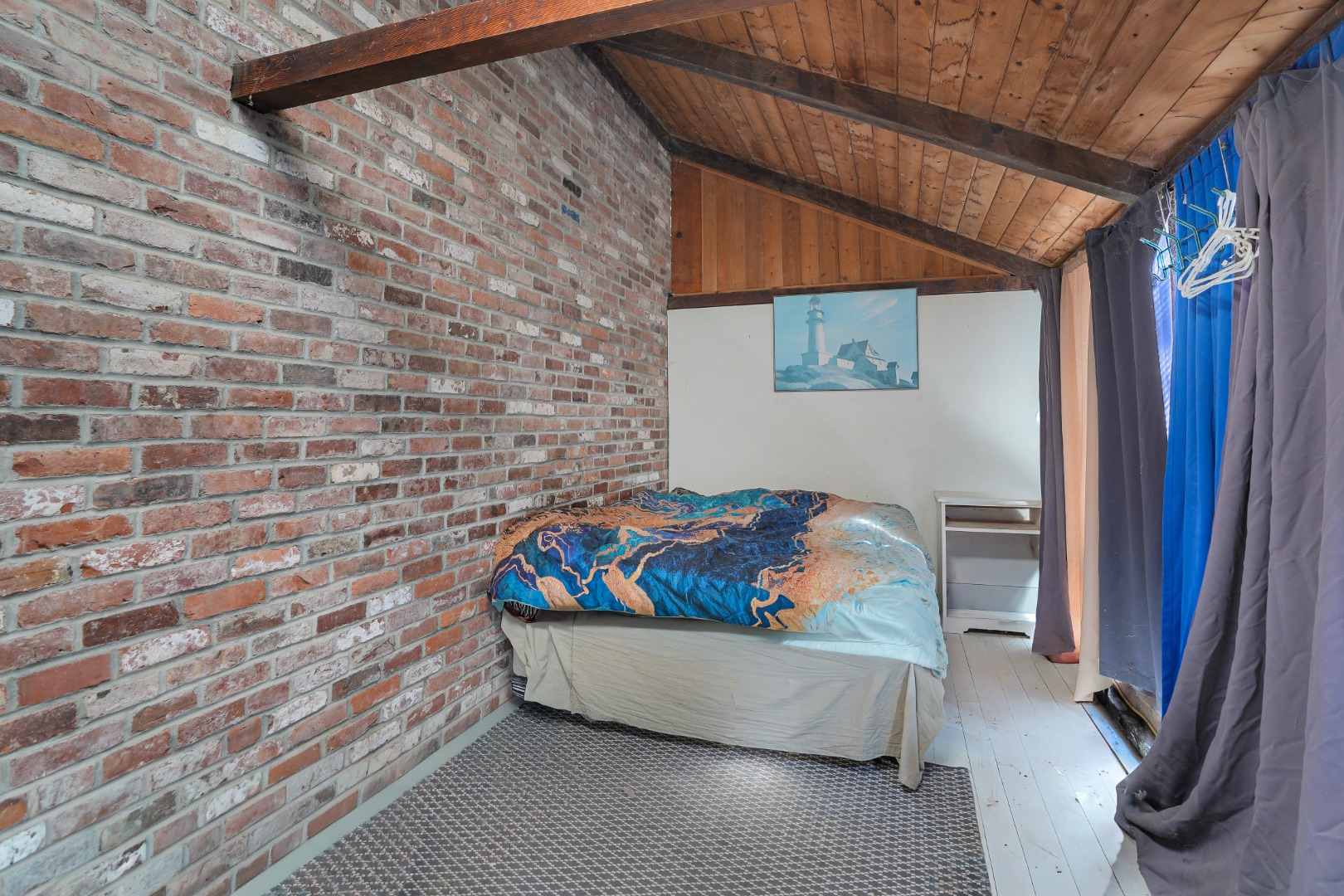 25 Vineyard Meadow Farms Road West Tisbury, MA 02568 - Photo 5 of 18 a bed room with a bed and a couch