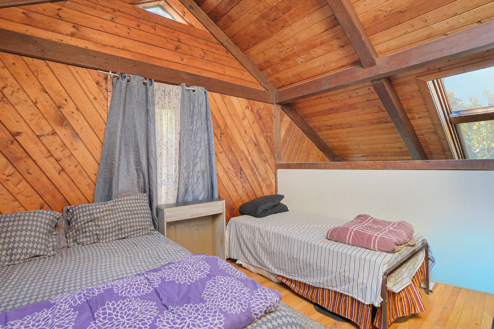 25 Vineyard Meadow Farms Road West Tisbury, MA 02568 - Photo 10 of 18 a bedroom with a bed and a window