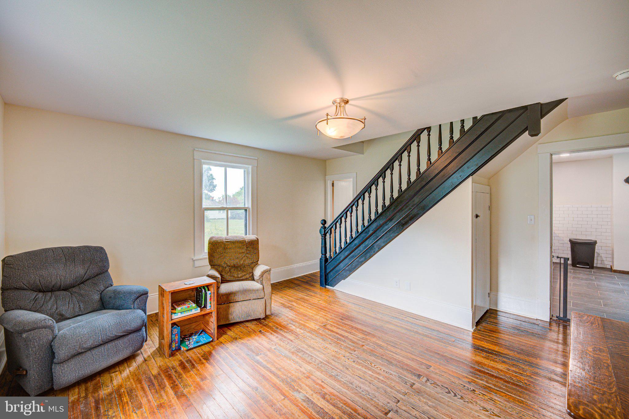 24177 Rapidan Road Mitchells, VA 22729 - Photo 9 of 43 Spacious living area with classic charm.