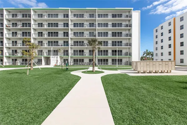 a view of building with garden