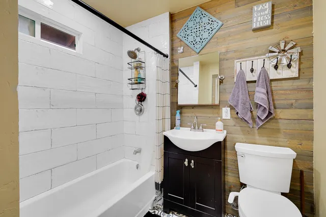 a bedroom with a bed and a walk in closet