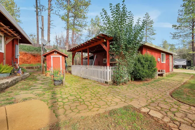 a living room with furniture and flat screen tv
