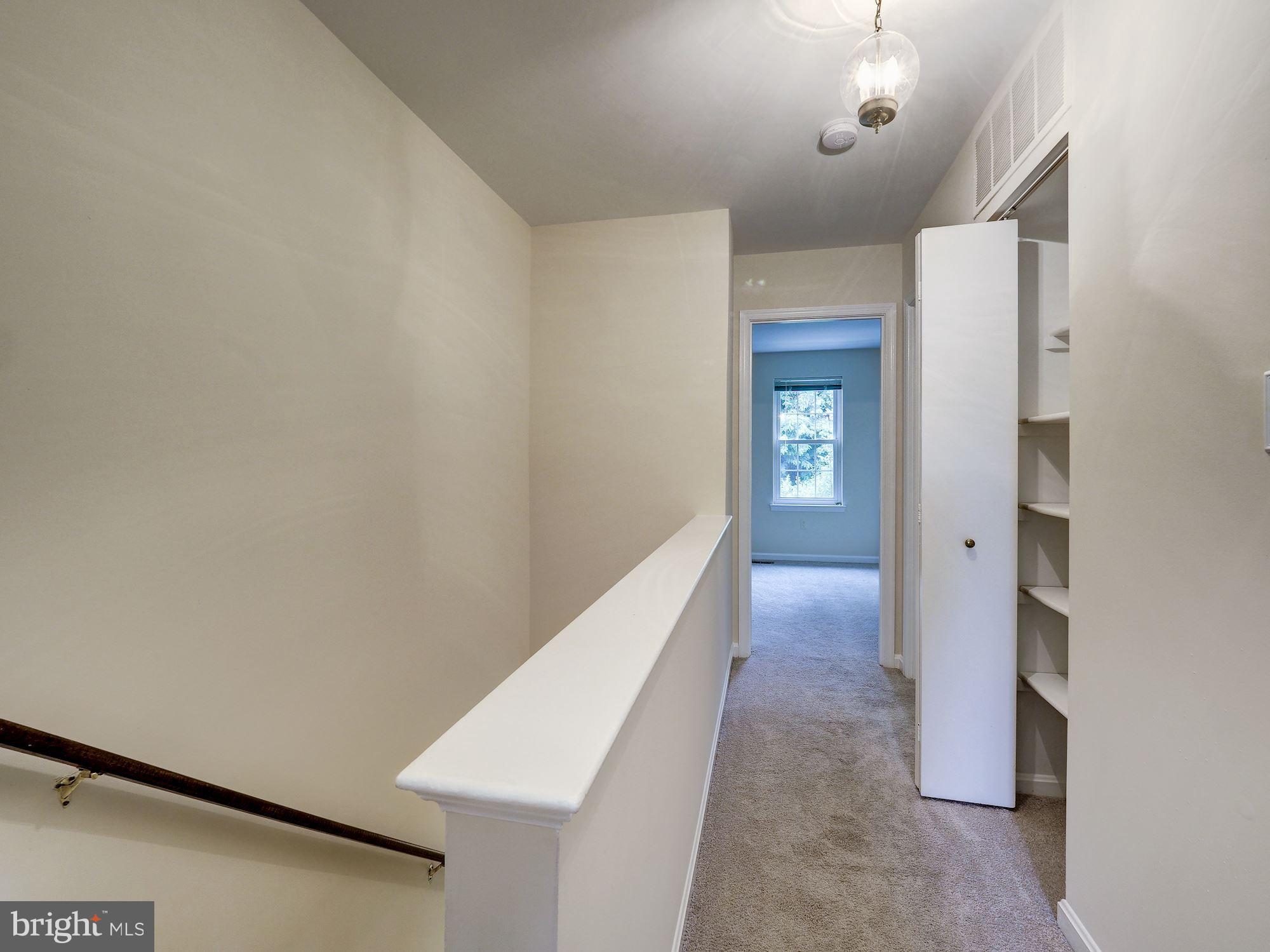 3815 Ferrara Drive Silver Spring, MD 20906 - Photo 23 of 39 Hallway with extra storage closet