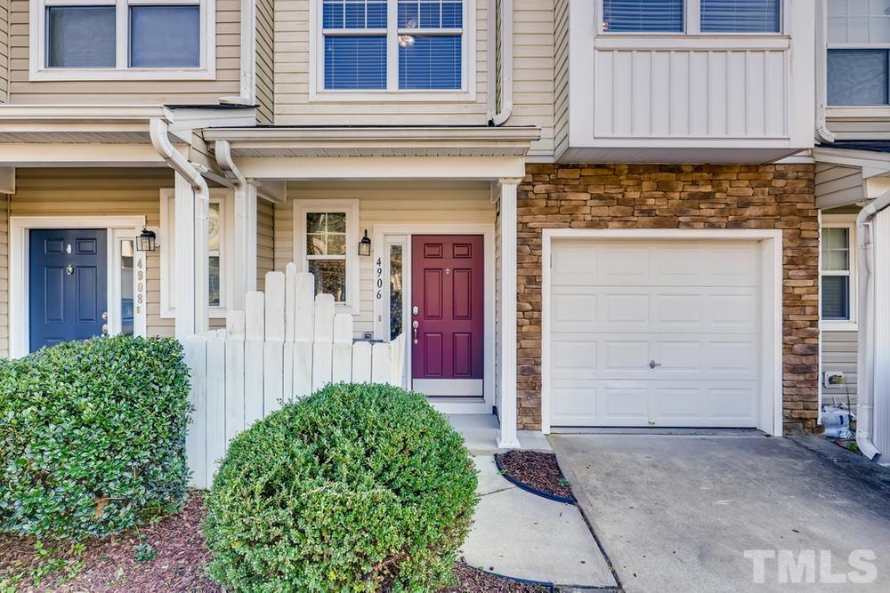 4906 Ravel Stone Court Raleigh, NC 27610 - Photo 3 of 28 front view of a house with a small yard