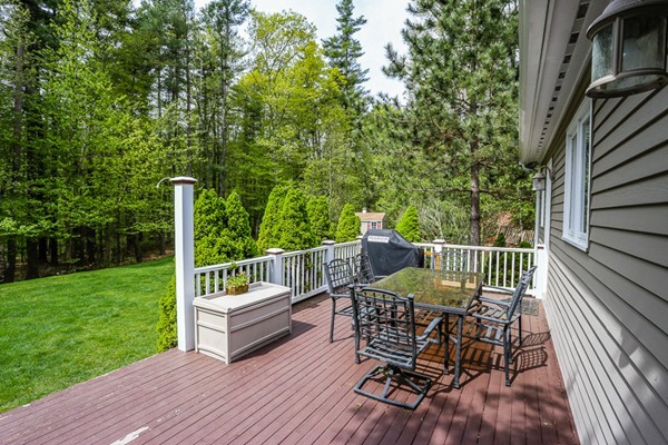 18 Saddle Hill Road Boxford, MA 01921 - Photo 20 of 20 a view of a wooden deck with furniture
