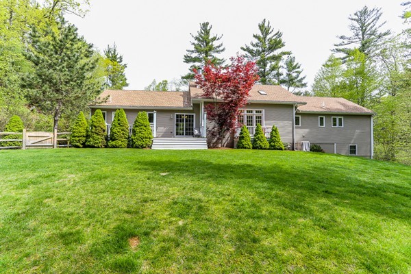 18 Saddle Hill Road Boxford, MA 01921 - Photo 2 of 20 a front view of house with yard and green space