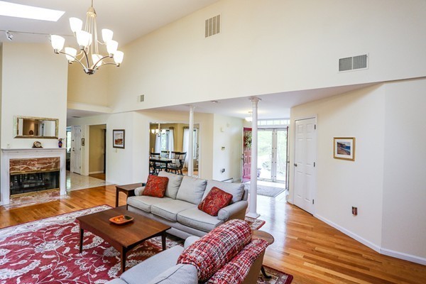 18 Saddle Hill Road Boxford, MA 01921 - Photo 4 of 20 a living room with furniture and a fireplace