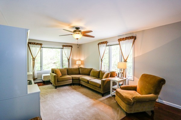 18 Saddle Hill Road Boxford, MA 01921 - Photo 9 of 20 a living room with furniture and a large window