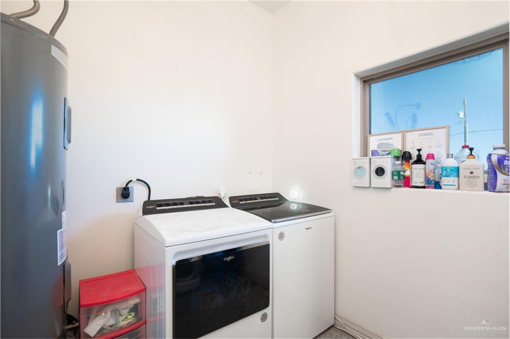 15421 Mile 20 Road Edinburg, TX 78542 - Photo 18 of 24 a utility room with dryer and washer
