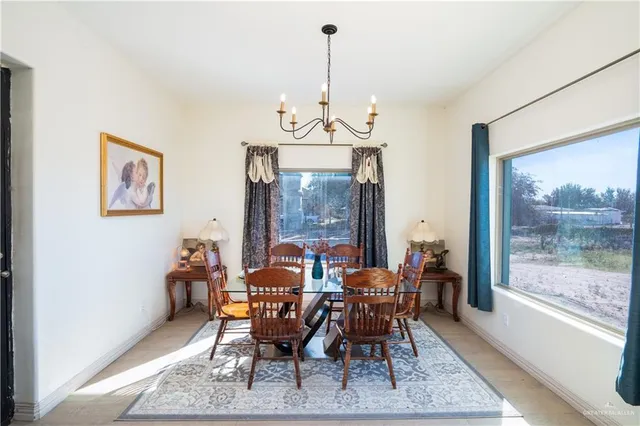 a kitchen with stainless steel appliances kitchen island granite countertop a refrigerator and a stove