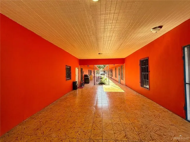 a view of a patio with swimming pool