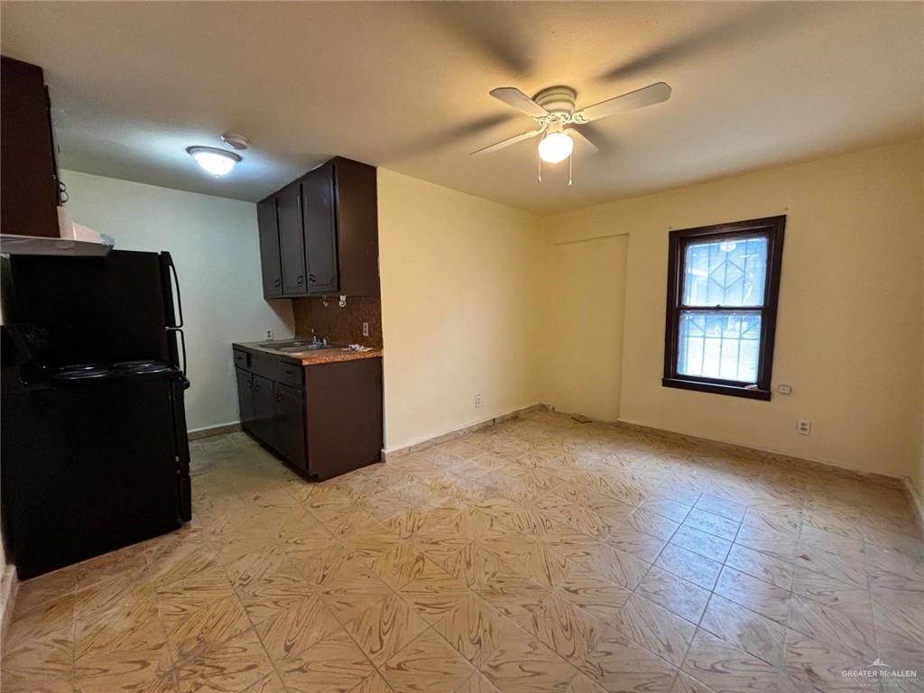 518 West U.S. Highway 83, Unit 3 Pharr, TX 78577 - Photo 2 of 5 a view of a livingroom with a kitchen