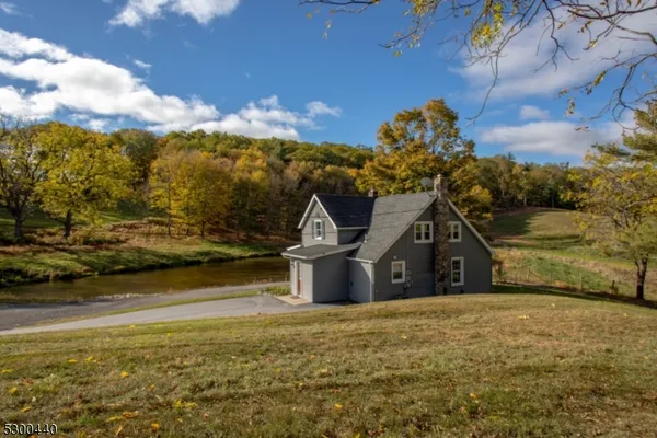 a view of a house with a ocean
