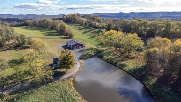 a view of a lake with mountains in the background
