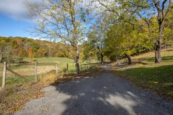 a view of a lake with a yard