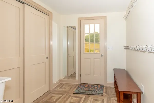 a view of a bathroom with sink and shower