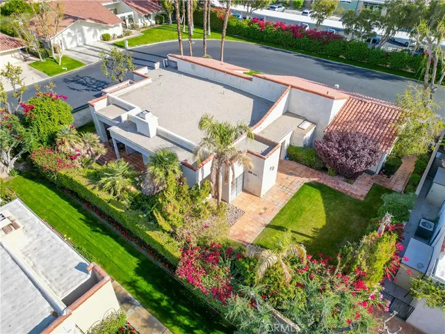 a view of a backyard with plants and garden