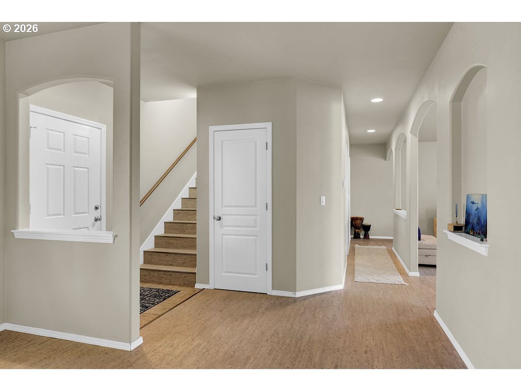 654 North Garden Way Eugene, OR 97401 - Photo 17 of 47 a view of entryway with livingroom and stairs