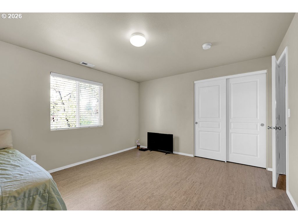 654 North Garden Way Eugene, OR 97401 - Photo 29 of 47 a view of an empty room with a window