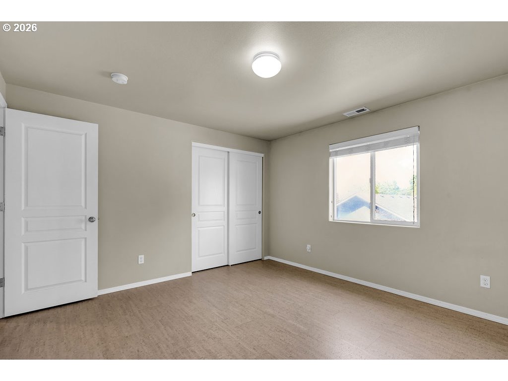 654 North Garden Way Eugene, OR 97401 - Photo 31 of 47 a view of an empty room with a window