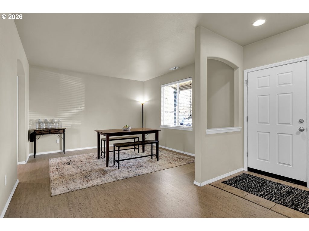 654 North Garden Way Eugene, OR 97401 - Photo 5 of 47 a view of an empty room and window