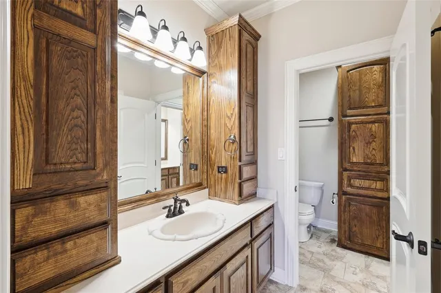 a bathroom with a sink double vanity and a mirror