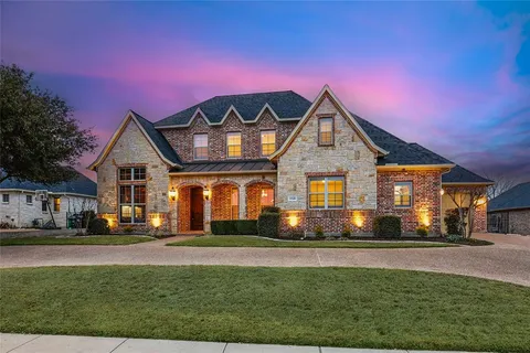 a living room with a flat screen tv and a fireplace