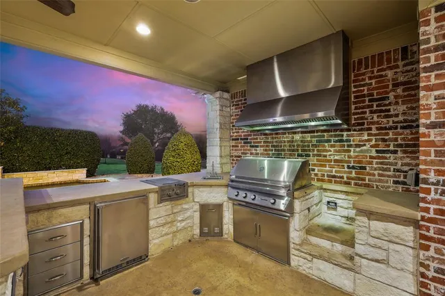 a view of a swimming pool with an outdoor seating