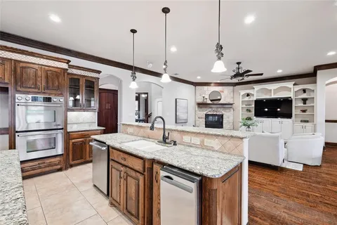 a kitchen with a stove and a microwave