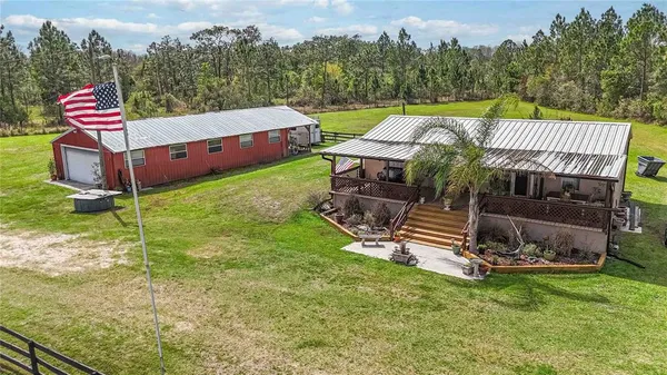 an outdoor sitting area with golf course
