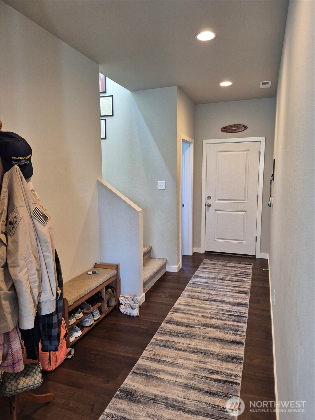 9204 Mint Loop Northwest Bremerton, WA 98311 - Photo 2 of 26 a view of a livingroom with furniture and a workspace