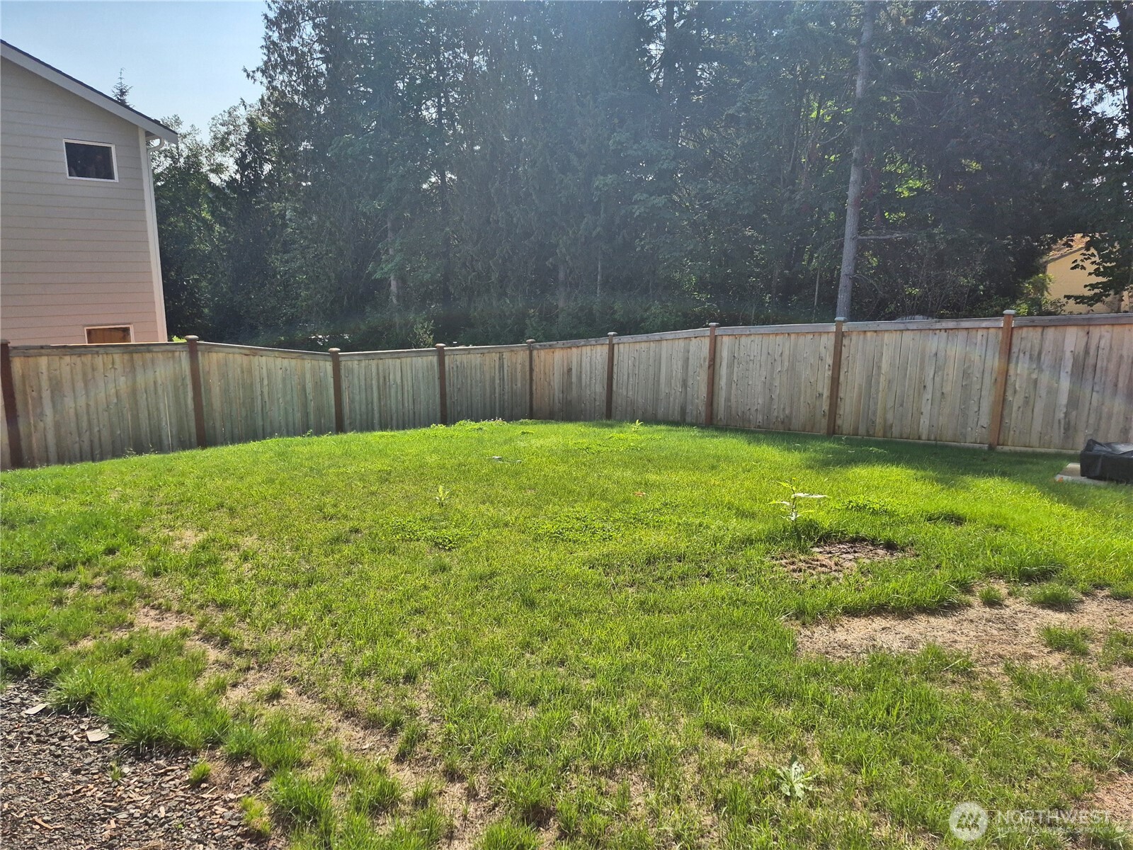 9204 Mint Loop Northwest Bremerton, WA 98311 - Photo 25 of 26 a view of a back yard