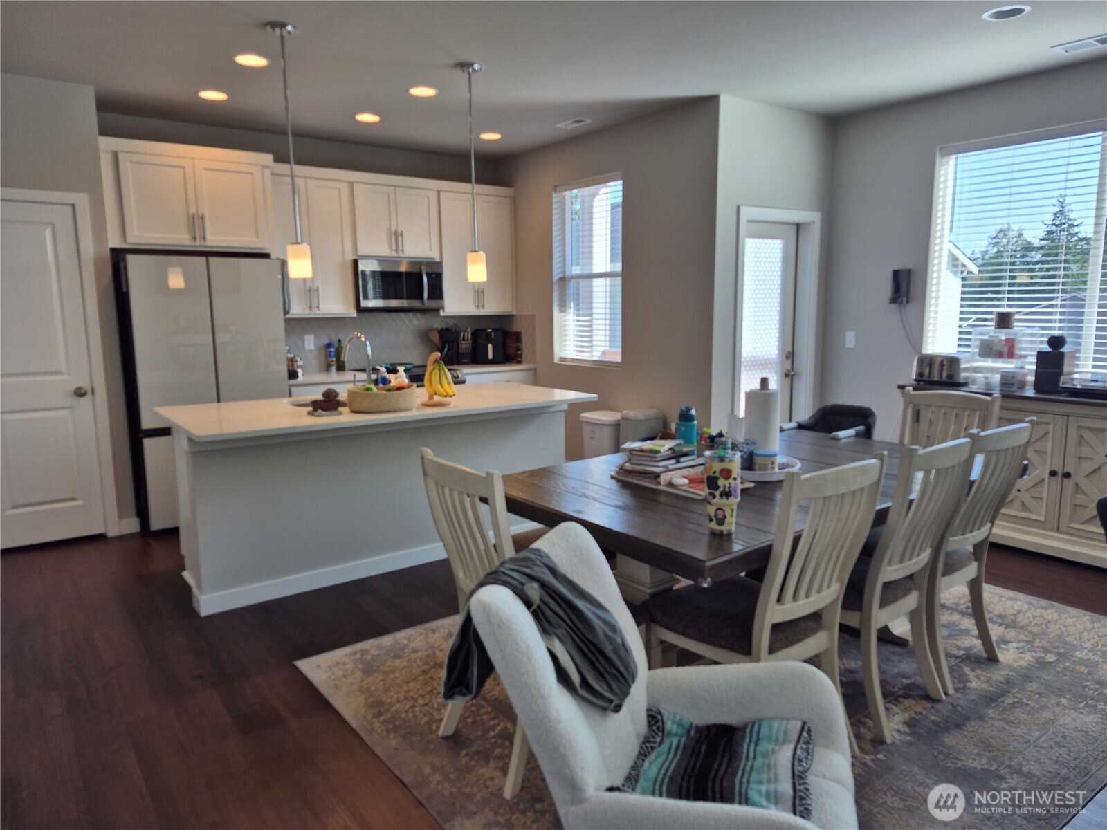 9204 Mint Loop Northwest Bremerton, WA 98311 - Photo 3 of 26 a view of a dining room with furniture