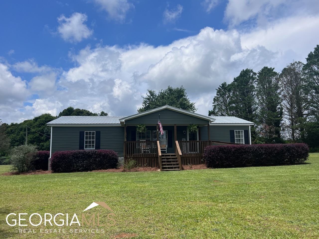 2729 Corinth Church Road Royston, GA 30662 - Photo 1 of 1 a front view of a house with garden