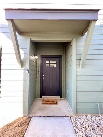 a entryway with a rug
