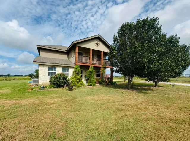 a house view with a outdoor space