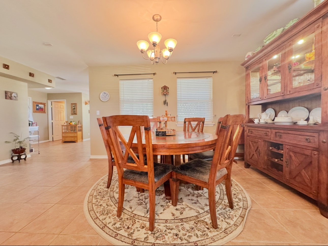 2334 County Road 464 Elgin, TX 78621 - Photo 11 of 39 a view of a dining room with furniture and chandelier