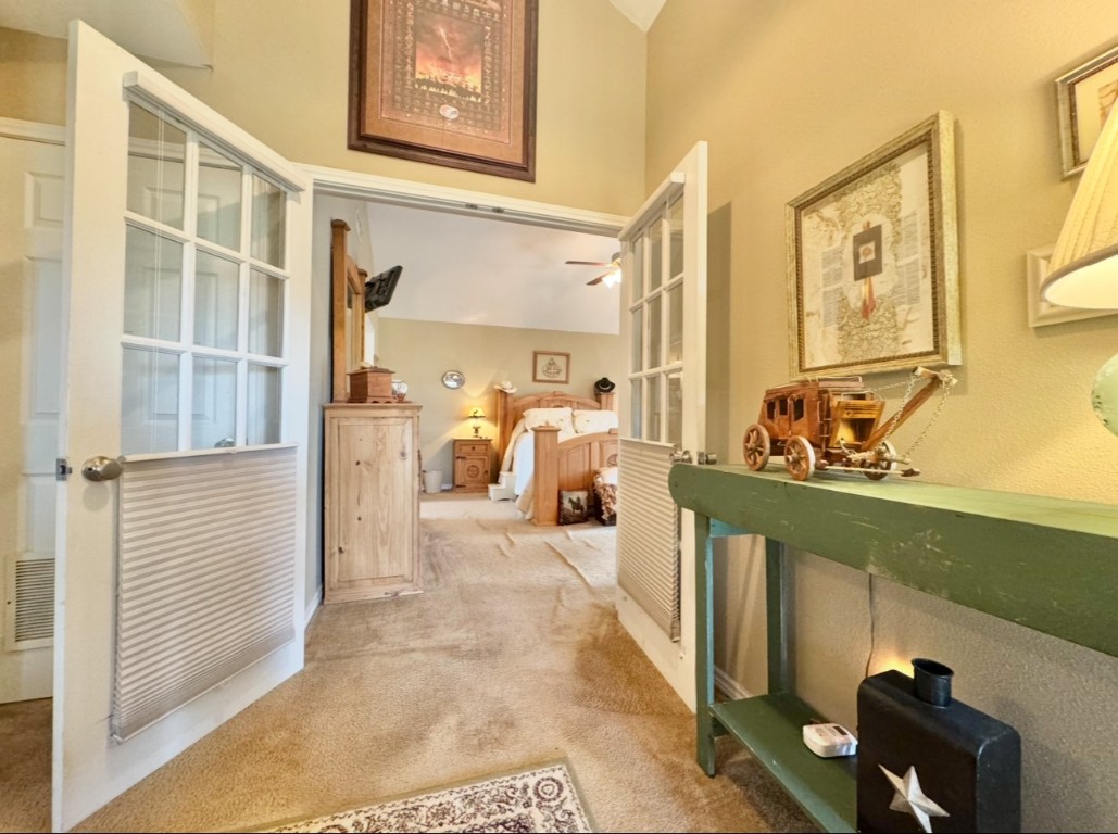 2334 County Road 464 Elgin, TX 78621 - Photo 21 of 39 Hallway with carpet floors
