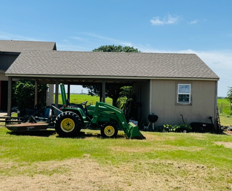 2334 County Road 464 Elgin, TX 78621 - Photo 34 of 39 a car parked in front of a house